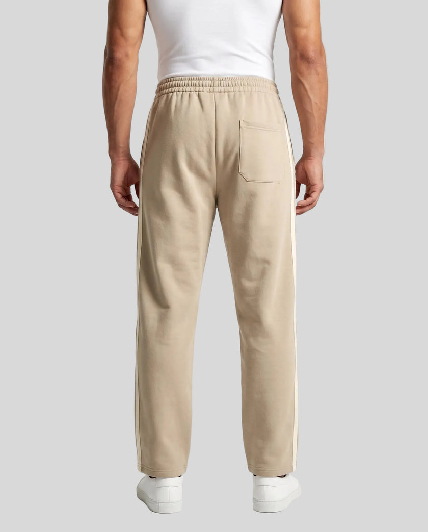 Model wearing TrackLine Club Pants in Khaki back view