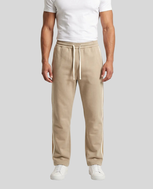Model wearing TrackLine Club Pants in Khaki front view