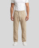 Model wearing TrackLine Club Pants in Khaki front view