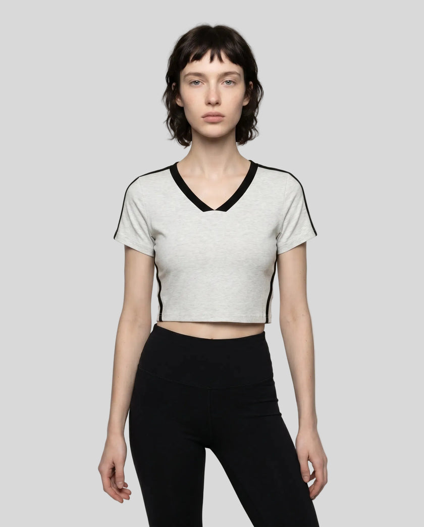 Model wearing TrackLine Club Tee in Flower Gray front view
