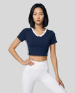 Model wearing TrackLine Club Tee in Navy Blue front view