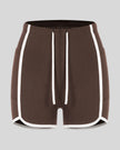 Front view of the TrackLine Color Block Performance Shorts in Coffee with White contrast trim