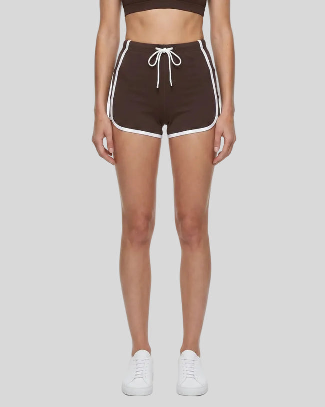 Model wearing the TrackLine Color Block Performance Shorts in Coffee, front view