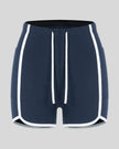 Front view of the TrackLine Color Block Performance Shorts in Navy Blue with White contrast trim
