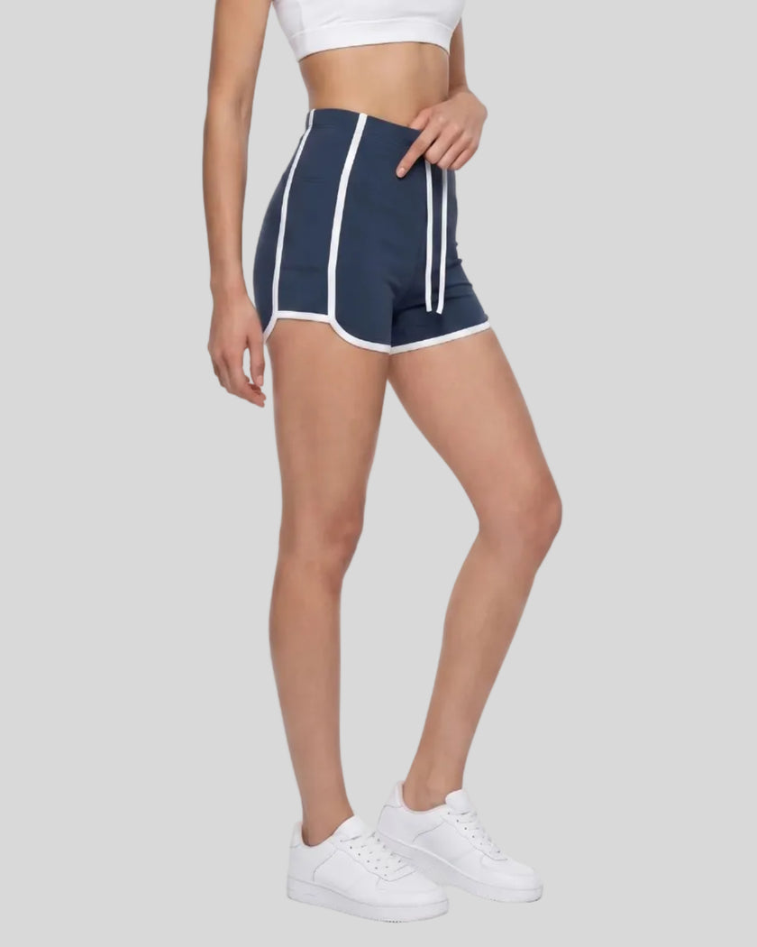 Model wearing the TrackLine Color Block Performance Shorts in Navy Blue, front angle view