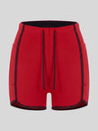 Front view of the TrackLine Color Block Performance Shorts in Red with Brown contrast trim