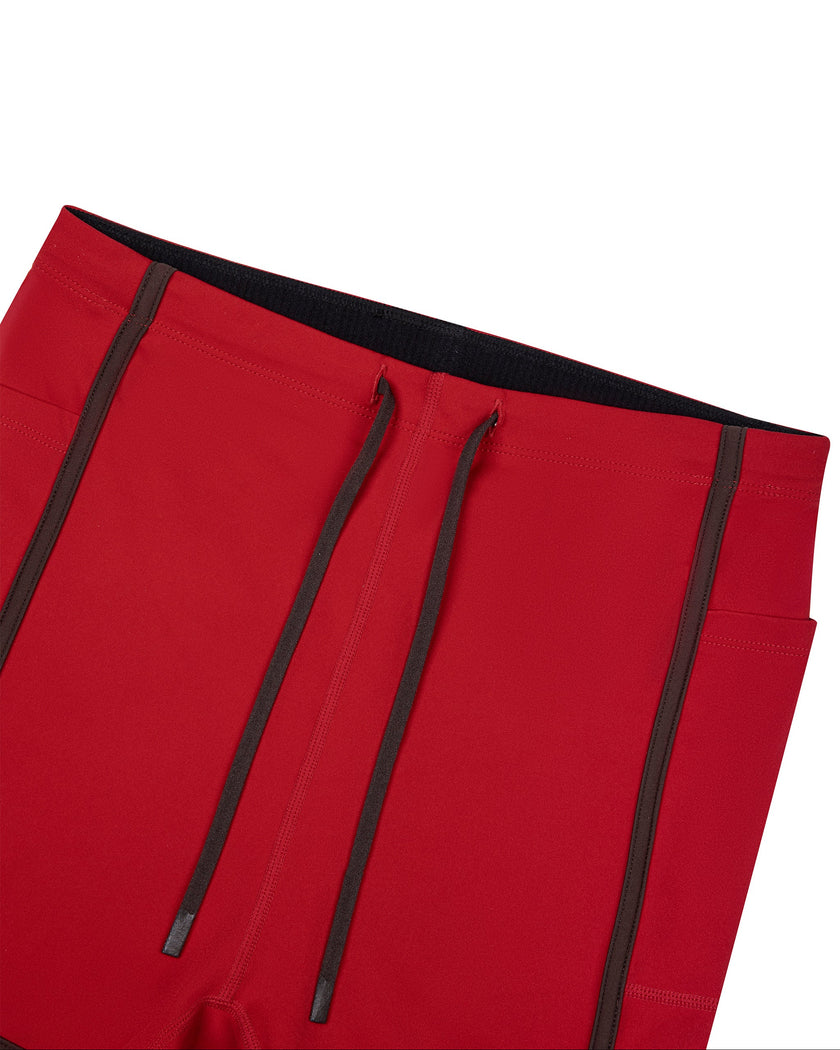Closeup of the drawstring waistband on the TrackLine Color Block Performance Shorts in Red
