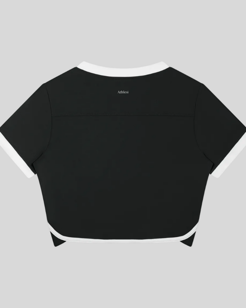 Back view of the TrackLine Color Block Performance Tee in Black with White contrast trim