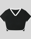 Front view of the TrackLine Color Block Performance Tee in Black with White contrast trim