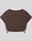 Back view of the TrackLine Color Block Performance Tee in Coffee with White contrast trim