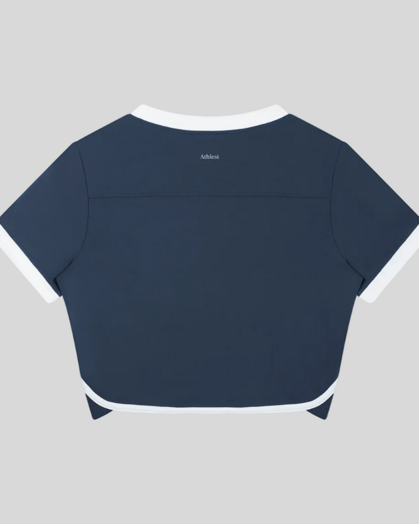 Back view of the TrackLine Color Block Performance Tee in Navy Blue with White contrast trim