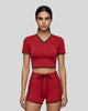 Model wearing the TrackLine Color Block Performance Tee in Red, front view