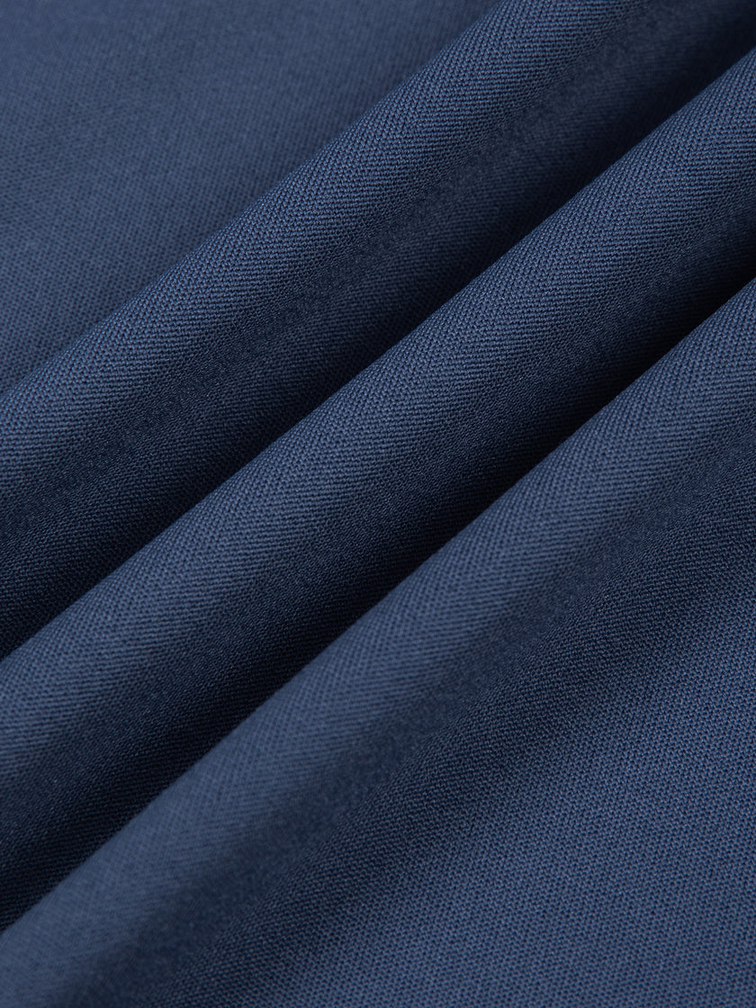 Athlesi TrackLine Color Block Skort in Navy Blue closeup showing smooth stretch fabric texture