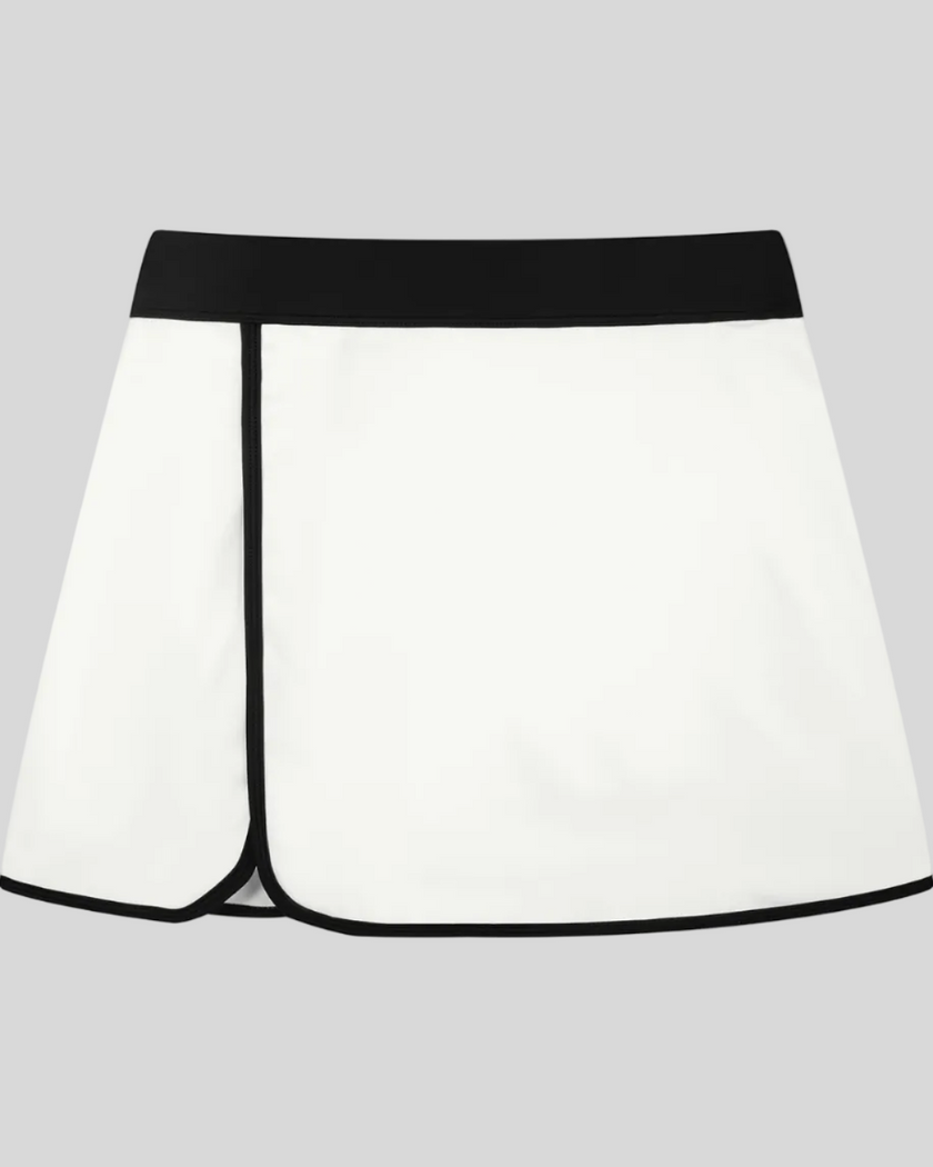 Athlesi TrackLine Color Block Skort in White front view with black waistband and contrast trim
