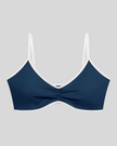Athlesi TrackLine Color Block Sports Bra in blue and white front view with ruched detail