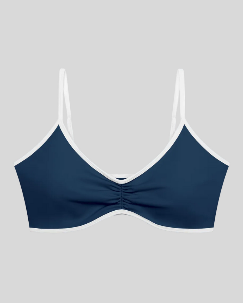 Athlesi TrackLine Color Block Sports Bra in blue and white front view with ruched detail