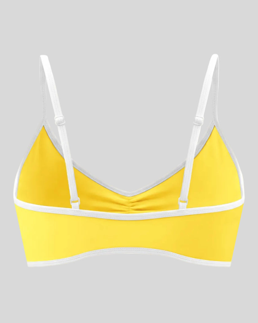 Athlesi TrackLine Color Block Sports Bra in yellow and white, 3d back view with contrast trim