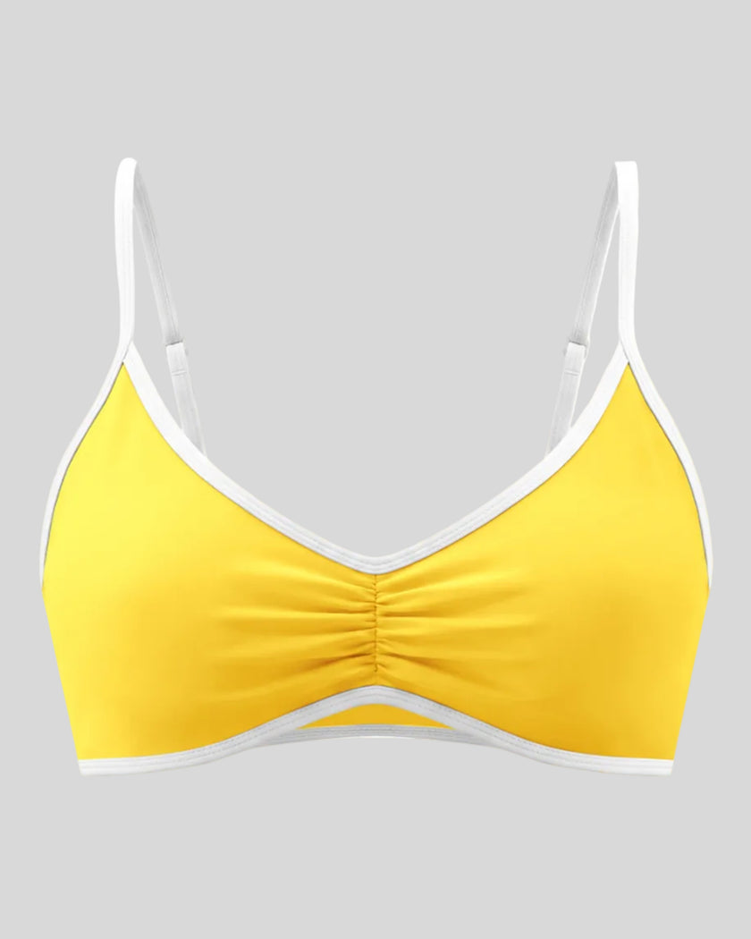 Athlesi TrackLine Color Block Sports Bra in yellow and white, 3d front view with ruched detail