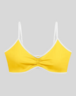 Athlesi TrackLine Color Block Sports Bra in yellow and white front view with ruched detail