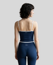 Back view of the TrackLine Color Block Tank in navy blue and white, showing the shoulder strap design