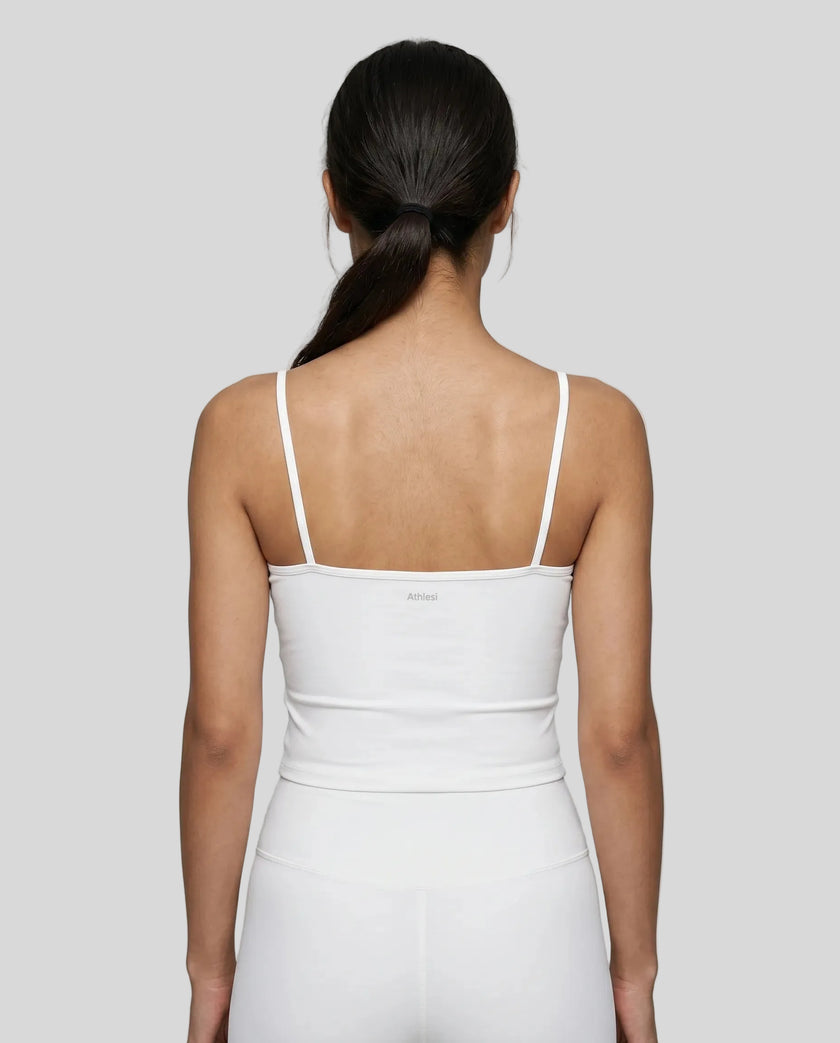 Back view of the TrackLine Color Block Tank in white, showing the shoulder strap design