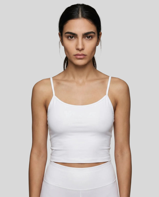 Model wearing the TrackLine Color Block Tank in white front view