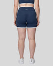 Model wearing the X-Large TrackLine Color Block Yoga Shorts in Navy Blue and White back view