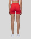 Back view of the TrackLine Color Block Yoga Shorts in Red and White
