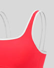 Angled view of the TrackLine Color Block Yoga Sports Bra in Red and White
