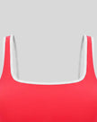 U-neckline and color block detail of the TrackLine Color Block Yoga Sports Bra