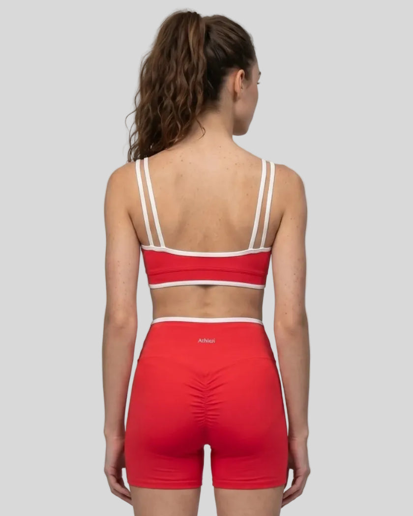 Back view of the TrackLine Color Block Yoga Sports Bra in Red and White