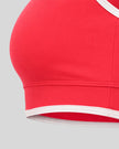Contrast trim and underbust detail of the TrackLine Color Block Yoga Sports Bra
