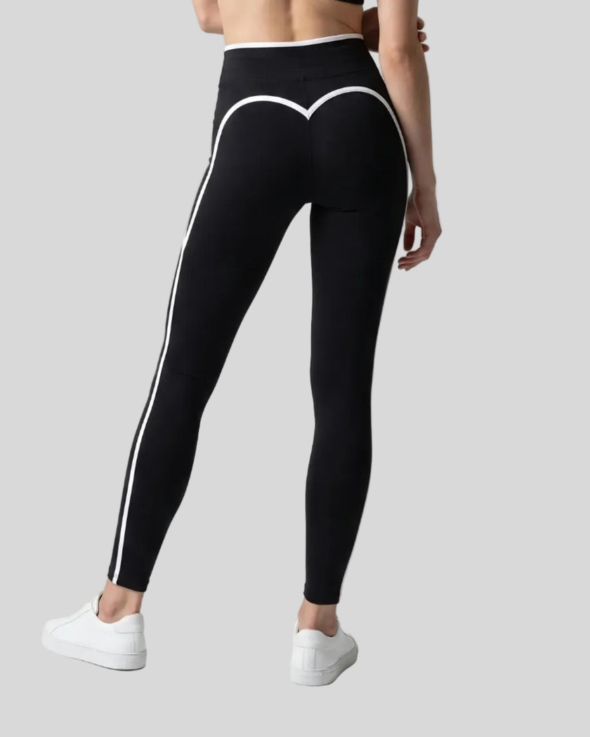 Model wearing the TrackLine Contour Yoga Leggings in Black, back view