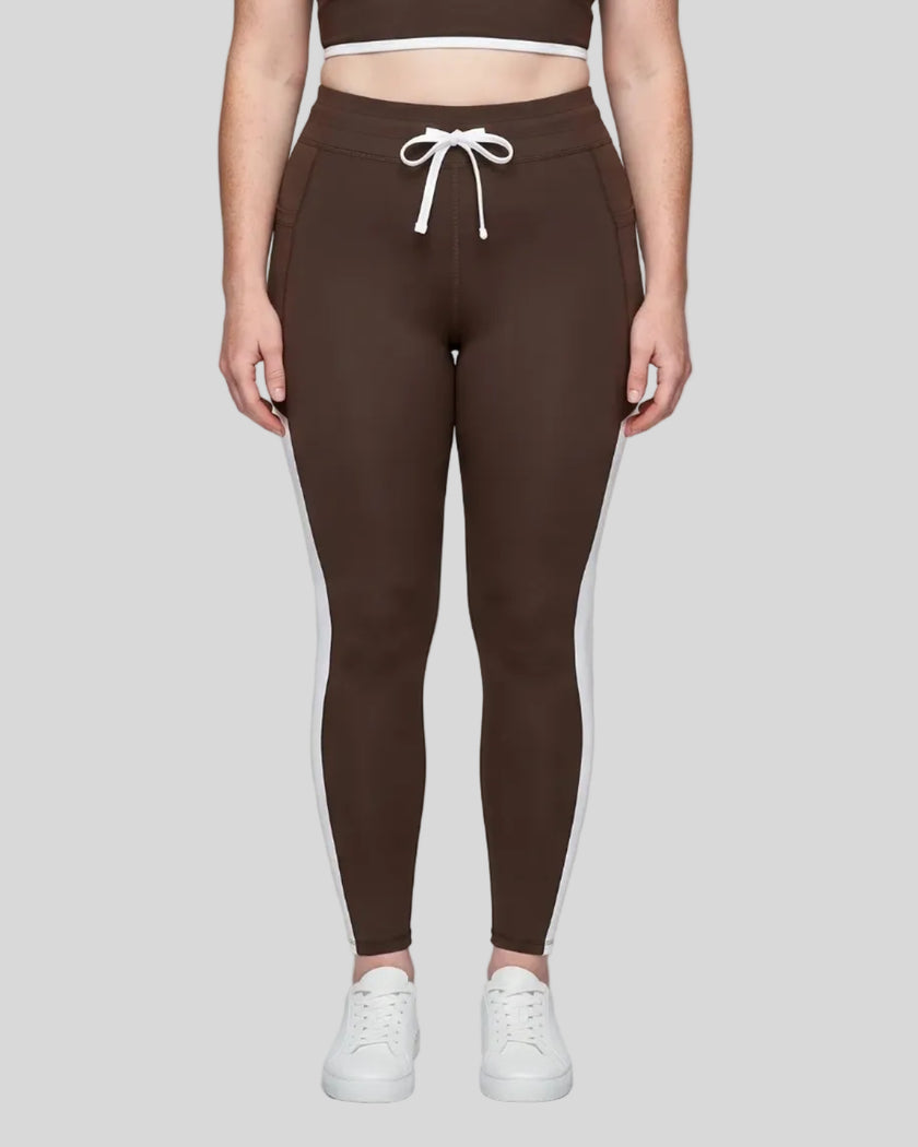 Model wearing the TrackLine Contour Yoga Leggings in Coffee, front view