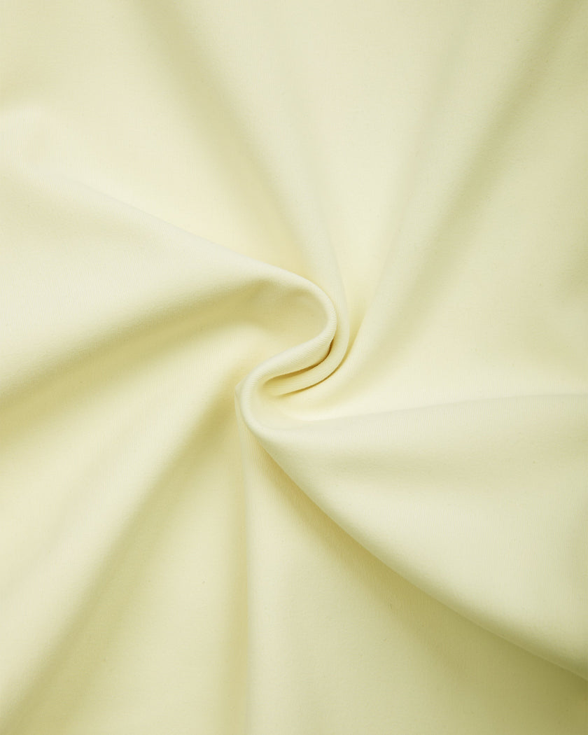 Detailed fabric texture view of the TrackLine Contour Yoga Leggings in Light Yellow (White)