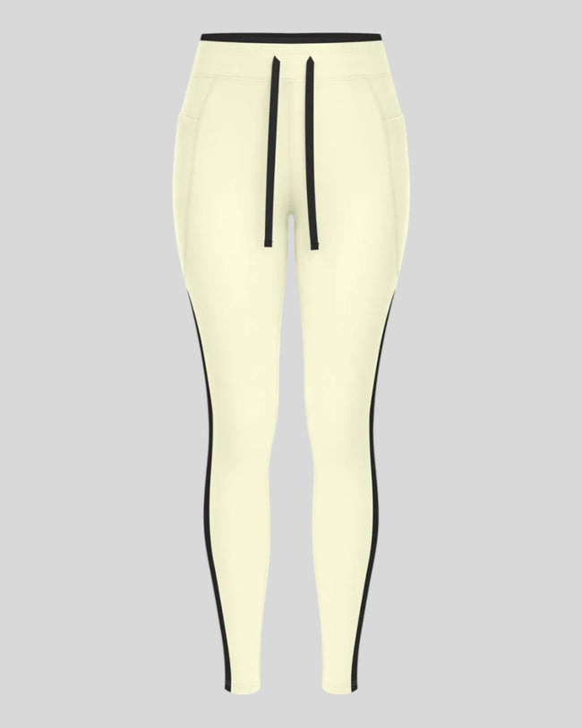 Front view of the TrackLine Contour Yoga Leggings in Light Yellow
