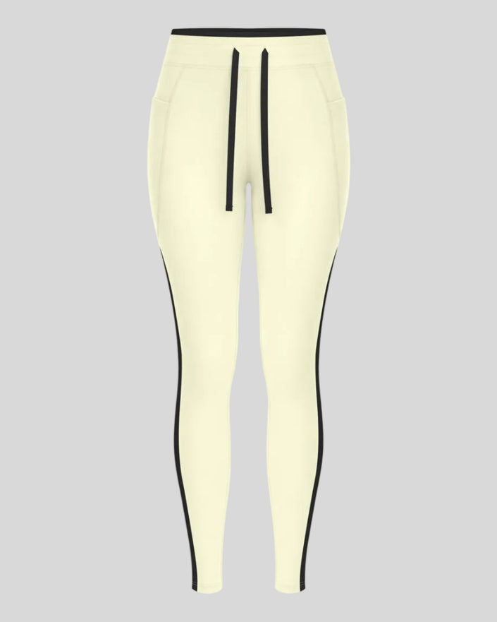 Front view of the TrackLine Contour Yoga Leggings in Light Yellow