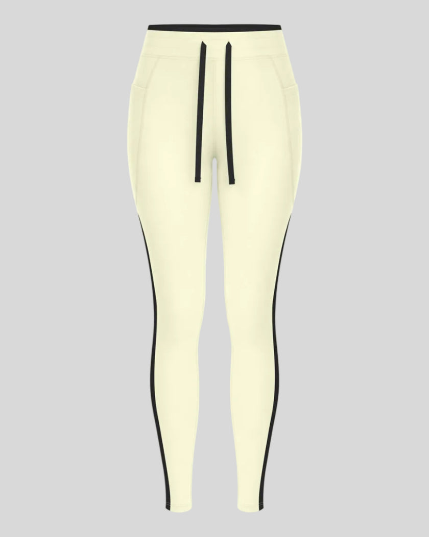 Front view of the TrackLine Contour Yoga Leggings in Light Yellow