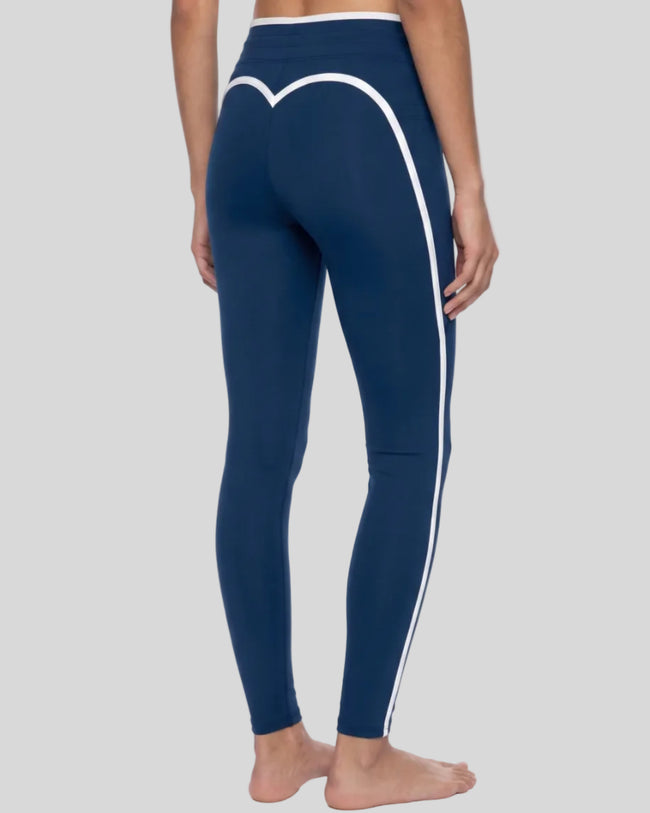 Model wearing the TrackLine Contour Yoga Leggings in Navy Blue, back angle view