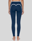 Model wearing the TrackLine Contour Yoga Leggings in Navy Blue, back view