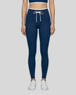 Model wearing the TrackLine Contour Yoga Leggings in Navy Blue, front view