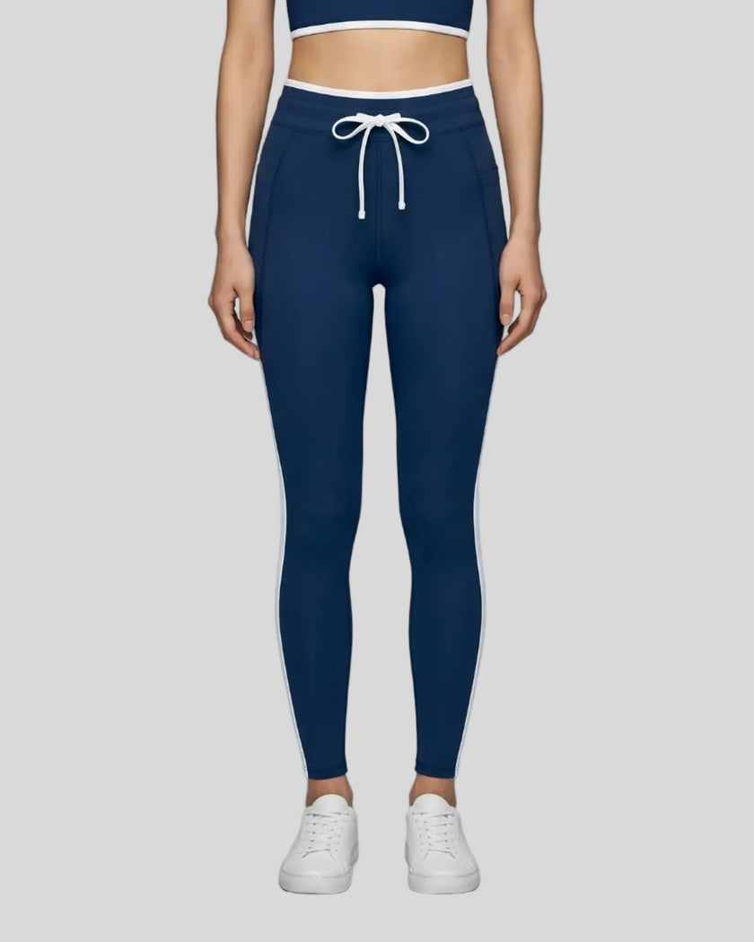 Model wearing the TrackLine Contour Yoga Leggings in Navy Blue, front view
