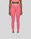 Model wearing the TrackLine Contour Yoga Leggings in Pink, front view