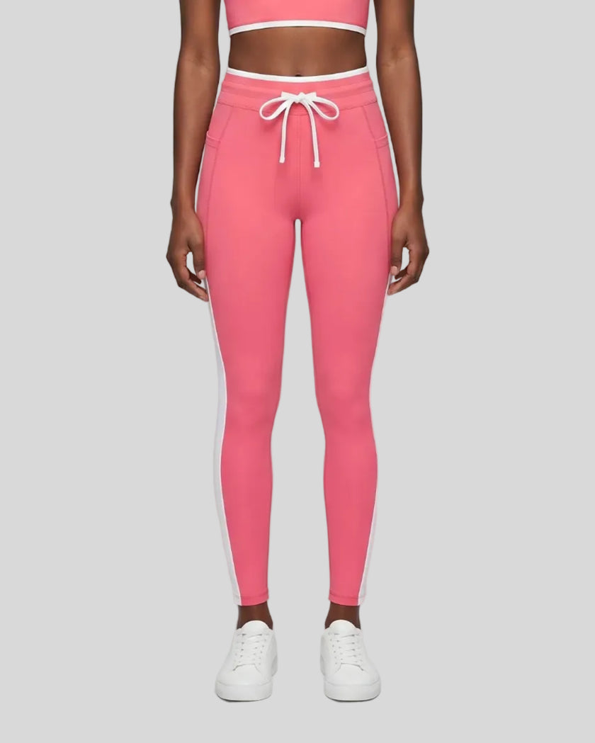 Model wearing the TrackLine Contour Yoga Leggings in Pink, front view