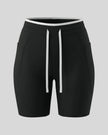 Front view of the TrackLine Contour Yoga Shorts in Black