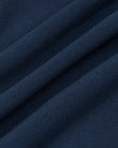 Closeup of the stretch performance fabric used in the TrackLine Contour Yoga Shorts in Navy Blue