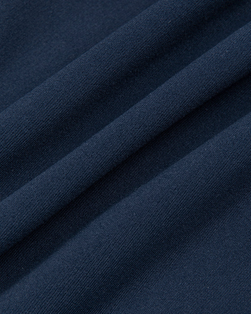 Closeup of the stretch performance fabric used in the TrackLine Contour Yoga Shorts in Navy Blue