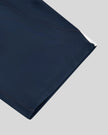 Closeup of the leg opening and hem detail on the TrackLine Contour Yoga Shorts in Navy Blue