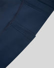 Closeup of the side pocket and contour piping on the TrackLine Contour Yoga Shorts in Navy Blue