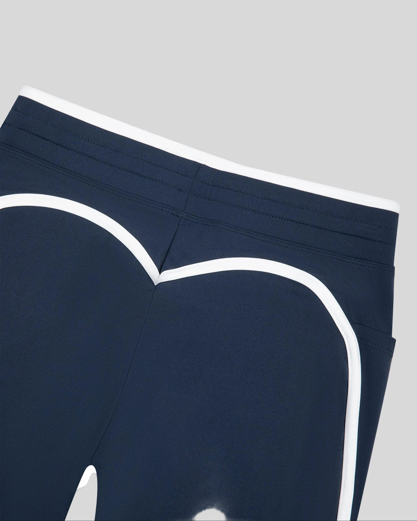Closeup of the back waistband and contour seam detail on the TrackLine Contour Yoga Shorts in Navy Blue